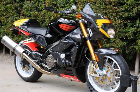 The market price (msrp) of aprilia tuono 1000 r approximately to be from $9,550 to $1,400 and users rating for aprilia. APRILIA Tuono 1000 Racing - 2002, 2003 - autoevolution