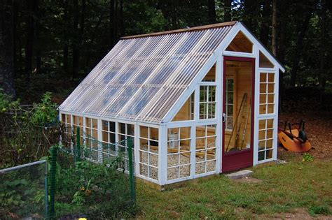 Custom Backyard Greenhouse With Recycled Windows Backyard Greenhouse