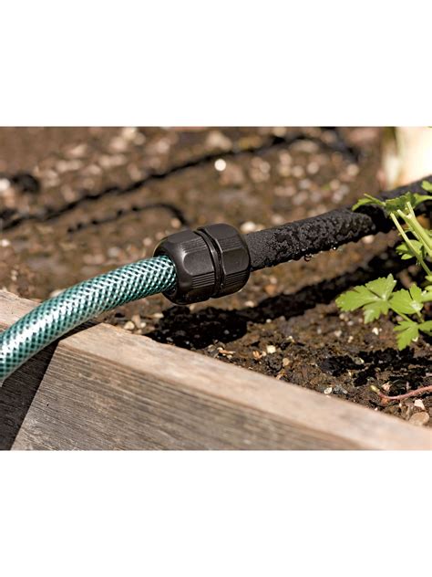 It holds three glass shelves. Gardener's Supply Company Snip-n-Drip Soaker Hose System ...