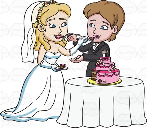 A Lesbian Couple Feeding Each Other A Slice Of Wedding Cake