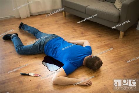 Dead Man Body Lying On Floor At Crime Scene Stock Photo Picture And