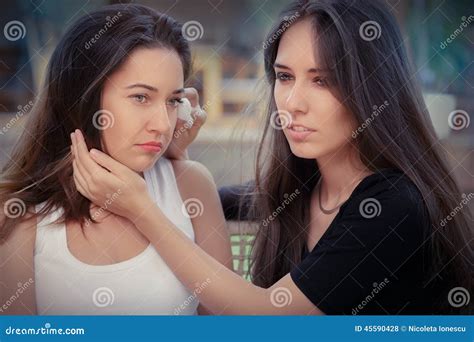Young Woman Comforting Tearful Friend Stock Photo Image Of Close