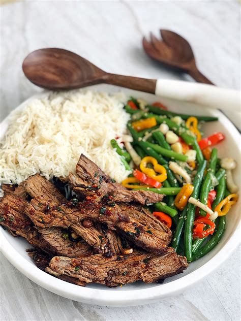 Heat 1 tablespoon peanut oil in a large skillet over high heat. Chinese Spicy Shaved Beef Bites | Recipe in 2020 | Food ...