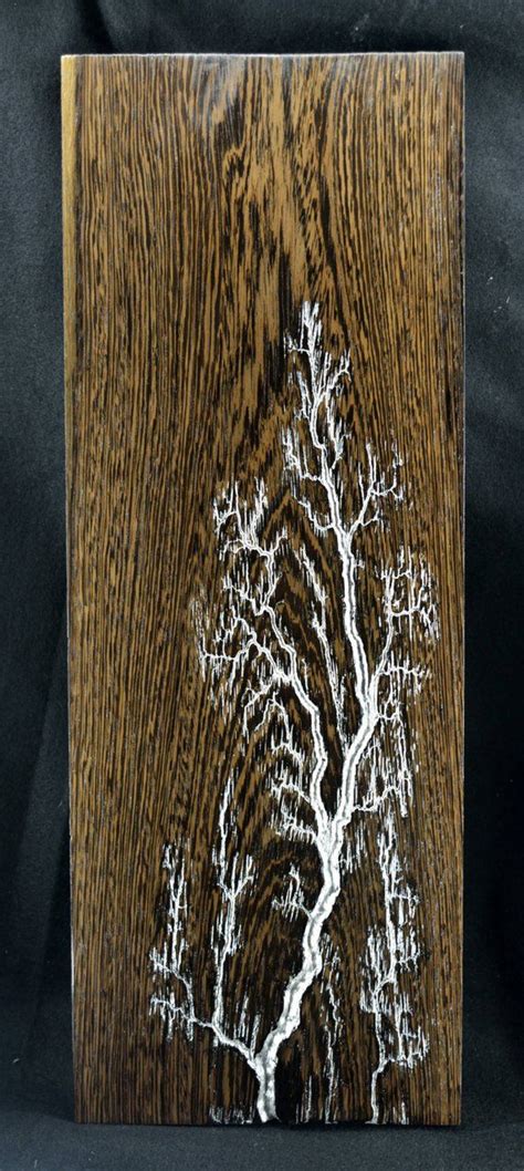 Lichtenberg figure on wenge with silver leaf inlay | Lichtenberg ...