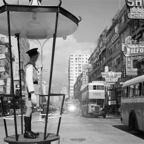 hong kong policeman directing traffic 1950s minibonds lehman flickr