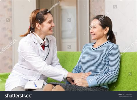 Doctor Touching Stomach Mature Patient Clinic库存照片128472695 Shutterstock