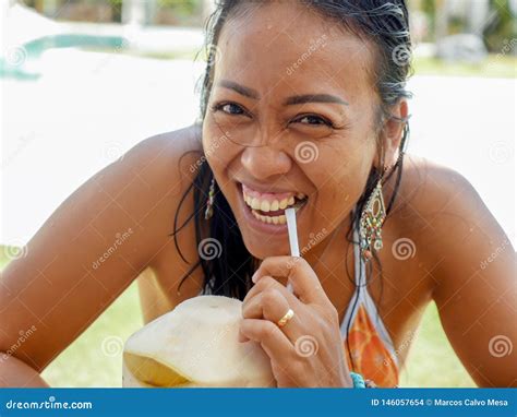 Lifestyle Natural Portrait Of 30s Or 40s Happy And Attractive Asian Indonesian Woman In Bikini