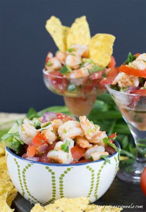 Shrimp ceviche is the perfect appetizer, made with shrimp cooked in lemon and lime juice, mixed with tomato, cucumber, avocado, and spicy jalapeños, topped with cilantro and ready in just 30 minutes! Shrimp Ceviche - Easy Peasy Meals