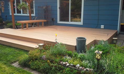 Classy modern house with a large deck surrounding the pool. Photo Gallery | Brushmasters Painting & Powerwashing