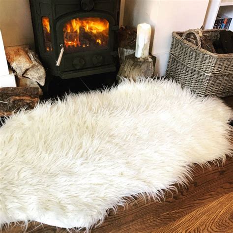 But when we set out to buy a big fluffy rug for living room, the plethora of options made us retreat rather quickly. Soft Fluffy Cream Faux Double Sheepskin Rug | Fluffy rugs bedroom, Carpet runner, Faux sheepskin rug
