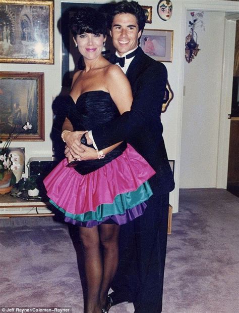 a man and woman dressed in costume posing for the camera