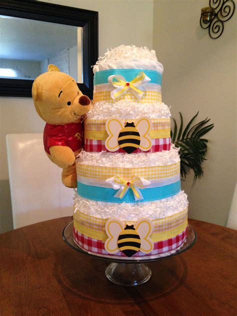 These are classic characters that are sure to be the hit of any party. Winnie the Pooh diaper cake | Baby girl diaper cake, Baby ...