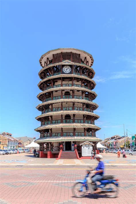 The outer part comprises a wooden cage made of cengal gayung wood but the inner structure is brick. Leaning Tower editorial photography. Image of architecture ...