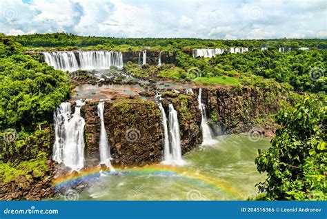 Rainbow At Iguazu Falls The Largest Waterfall In The World South
