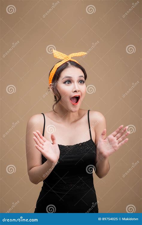 surprised asian girl with pretty smile in pinup style on yellow stock image image of sale