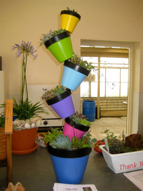 Another Colorful Tower Of Tipsy Pots Planted With A Variety Of
