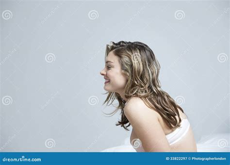 Young Woman In Bra Sitting On Bed Stock Image Image Of Glamour Pretty 33822297