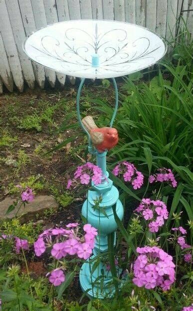 A Way To Use Up The Old Lamps Garden Crafts Glass Garden Art Garden Art