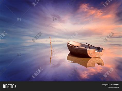 Lonely Boat Amazing Image And Photo Free Trial Bigstock