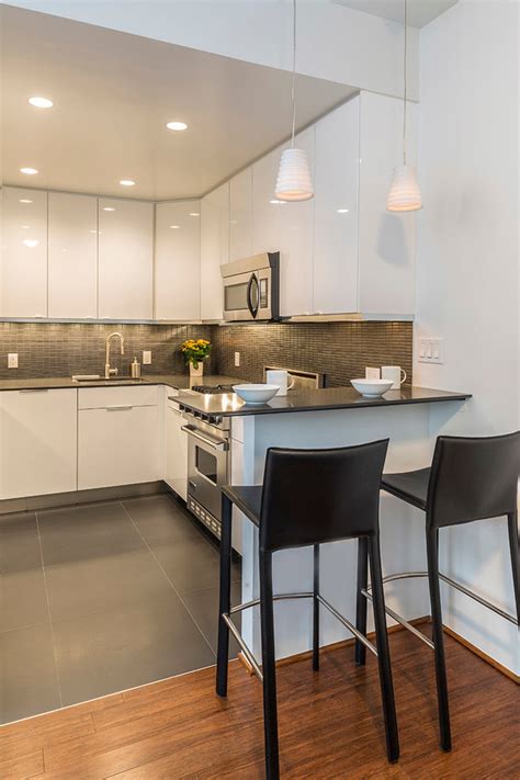 Home central offers quality appliances, kitchen cabinets and bath fixtures for the contractor or home owner. SoHo Triplex - Contemporary - Kitchen - New York - by Ira Frazin Architect