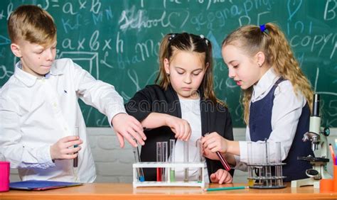 Students Doing Biology Experiments With Microscope In Lab Little Kids