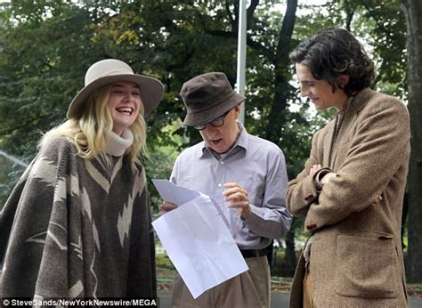 Elle Fanning Flashes Her Underwear In Trench Coat Daily Mail Online