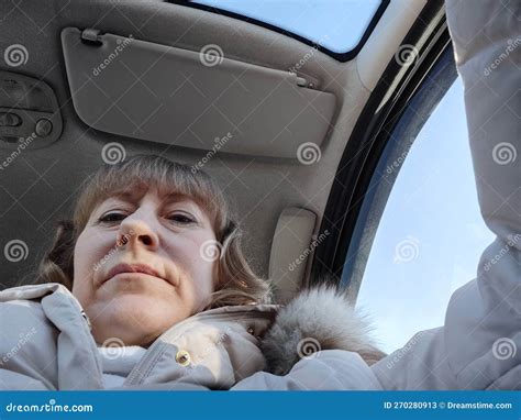 Woman Sitting In The Car In The Road Trip Blonde Senior Woman Driving Transport Lady