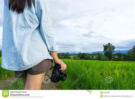 Girl Holding Cameralook Out To See Nature Stock Photo Image Of Door
