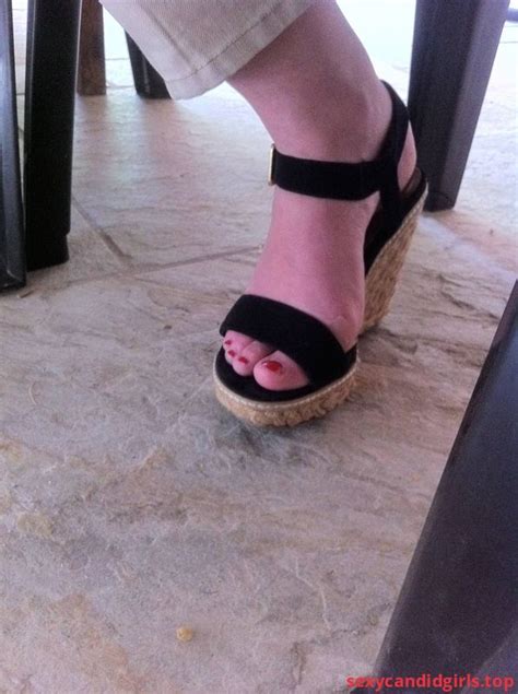Sexycandidgirlstop Foot In A High Heeled Sandal Under Table Creepshot Item 1