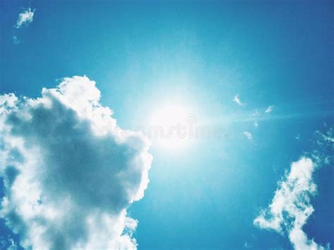 The Sun Brightly Shining In The Cloudy Sky Stock Image Image Of
