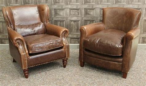 By erwine & estelle laverne. A vintage style leather armchair in quality brown aged ...