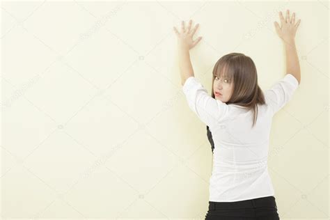 Woman With Hands On The Wall Stock Photo By ©felixtm 3387111
