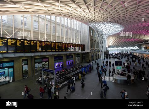 People On The Concourse And Departure Boards Inside Kings Cross