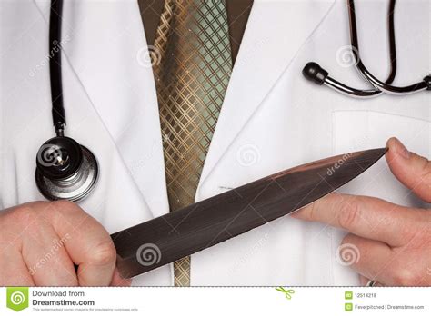 Doctor With Stethoscope Holding A Large Knife Stock Photo Image Of