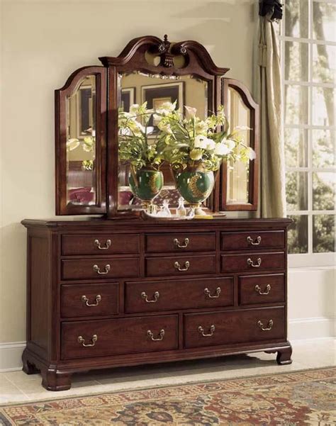 Four drawers run smoothly on metal glides, offering easy access to storage for clothing and bedroom items, all in a compact footprint for any bedroom size. Cherry Grove 45th Tri-Fold Mirror And Triple Dresser In ...