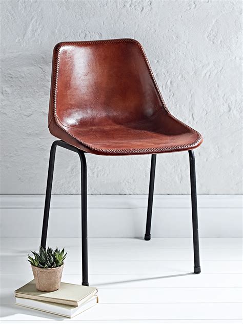 With classic farmhouse styling and constructed from acacia veneers and hardwood solids, you can't go wrong with this stylish seat. Our industrial inspired chair has strong black iron legs ...