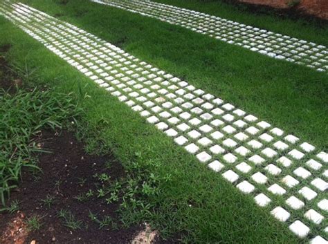 Generally designed in a hollow honeycomb pattern, these grid systems are laid over gravel and sand or topsoil. Gallery | Northwest landscaping, Grass driveway, Driveway landscaping