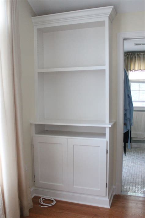 This goes for the bedroom as well. HOUSEography: Master Bedroom: Built-in Television Cabinet