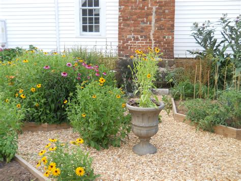 Raised Beds Surrounded By Pea Gravel Curb Appeal Pea Gravel Plant Lady