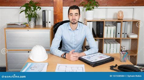 Handsome Serious Man Sit At Office Boss Manager Desk Stock Photo