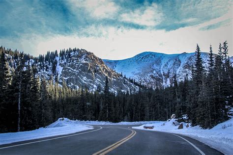 Snowy Mountain Road Photograph By Angela Moreau