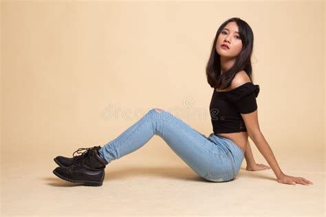 Full Body Of Beautiful Young Asian Woman Sit On Floor Stock Image