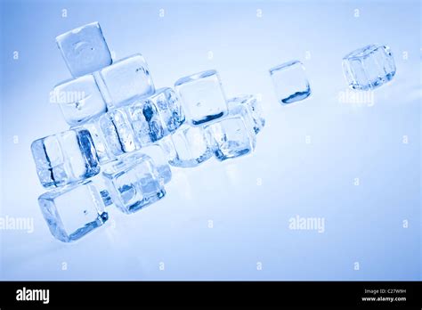 Frozen Ice Cubes Over Background Stock Photo Alamy