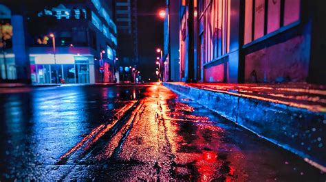Blurred background, night lights of a big. Download wallpaper 2560x1440 street, night, wet, neon ...