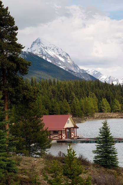 Premium Photo Curly Phillips Boathouse In Maligne Lake Jasper