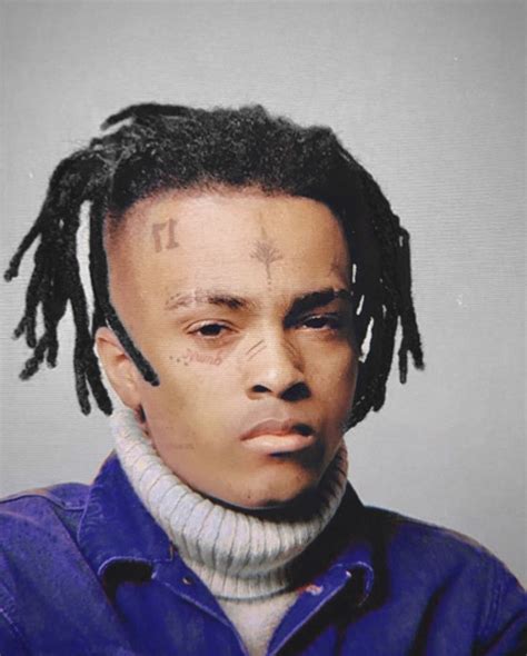 A couple take photos along a sea wall of the waves brought by typhoon haishen in the eastern port city of sokcho. Pin on XXXTENTACION