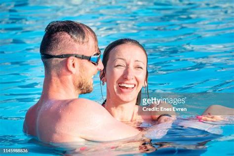 Couple Swimming Pool Photos And Premium High Res Pictures Getty Images