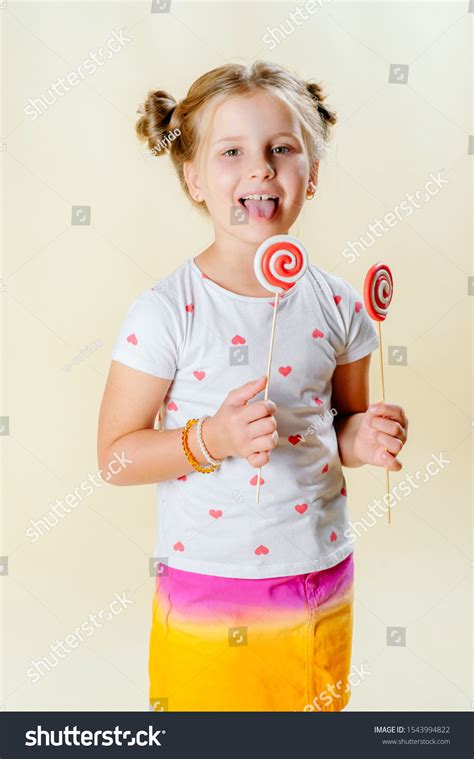 Child Candy Little Girl Holding Candy Stock Photo 1543994822 Shutterstock