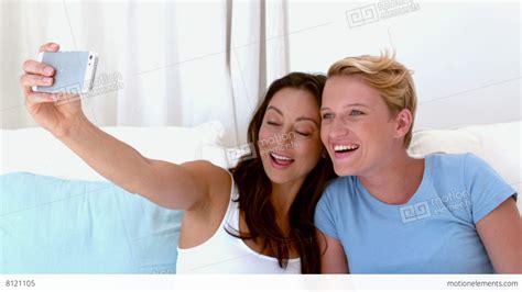 Lesbian Couple Taking A Selfie Stock Video Footage 8121105