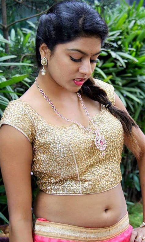 Hot Telugu Acress In Golden Blouse Exposing Navel With Juicy Clevage